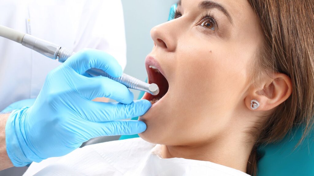 A Woman At Dental Clinic For Mini Dental Implant
