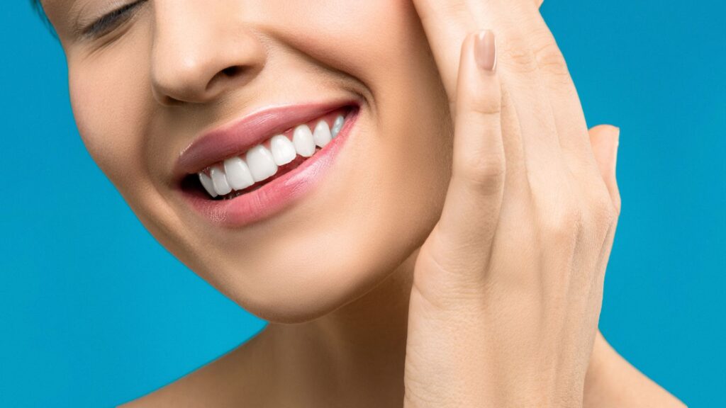 A Close-up Of A Woman Smiling