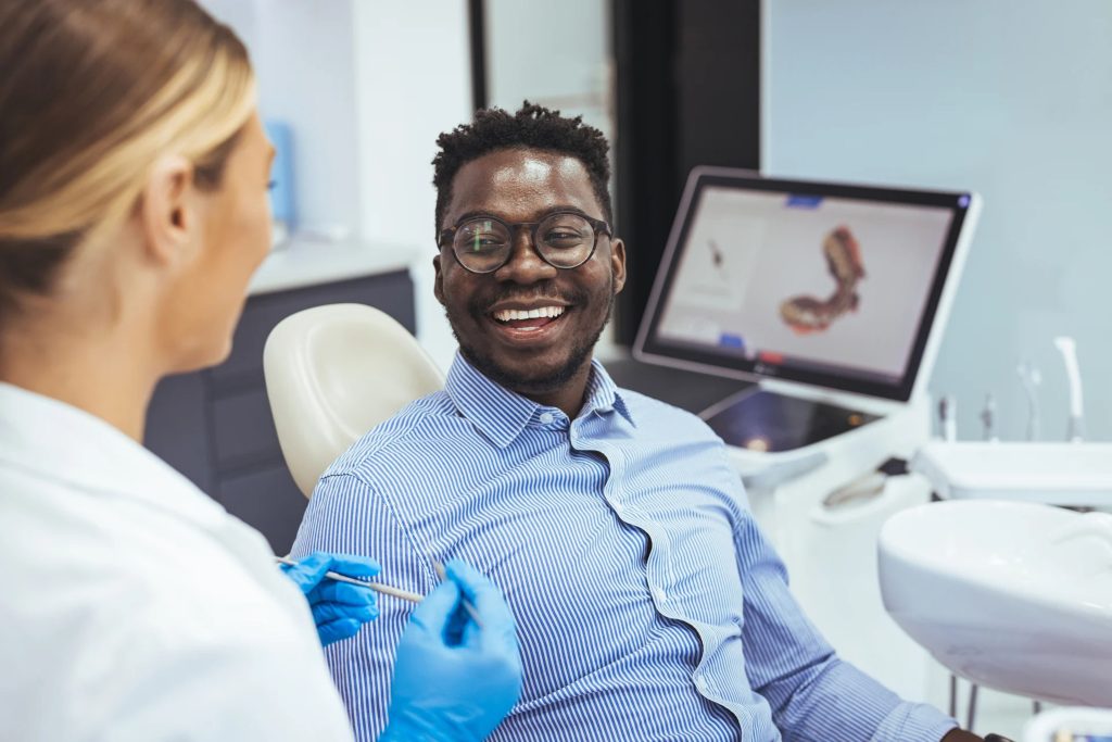 Dentist Discussing Invisalign Treatment